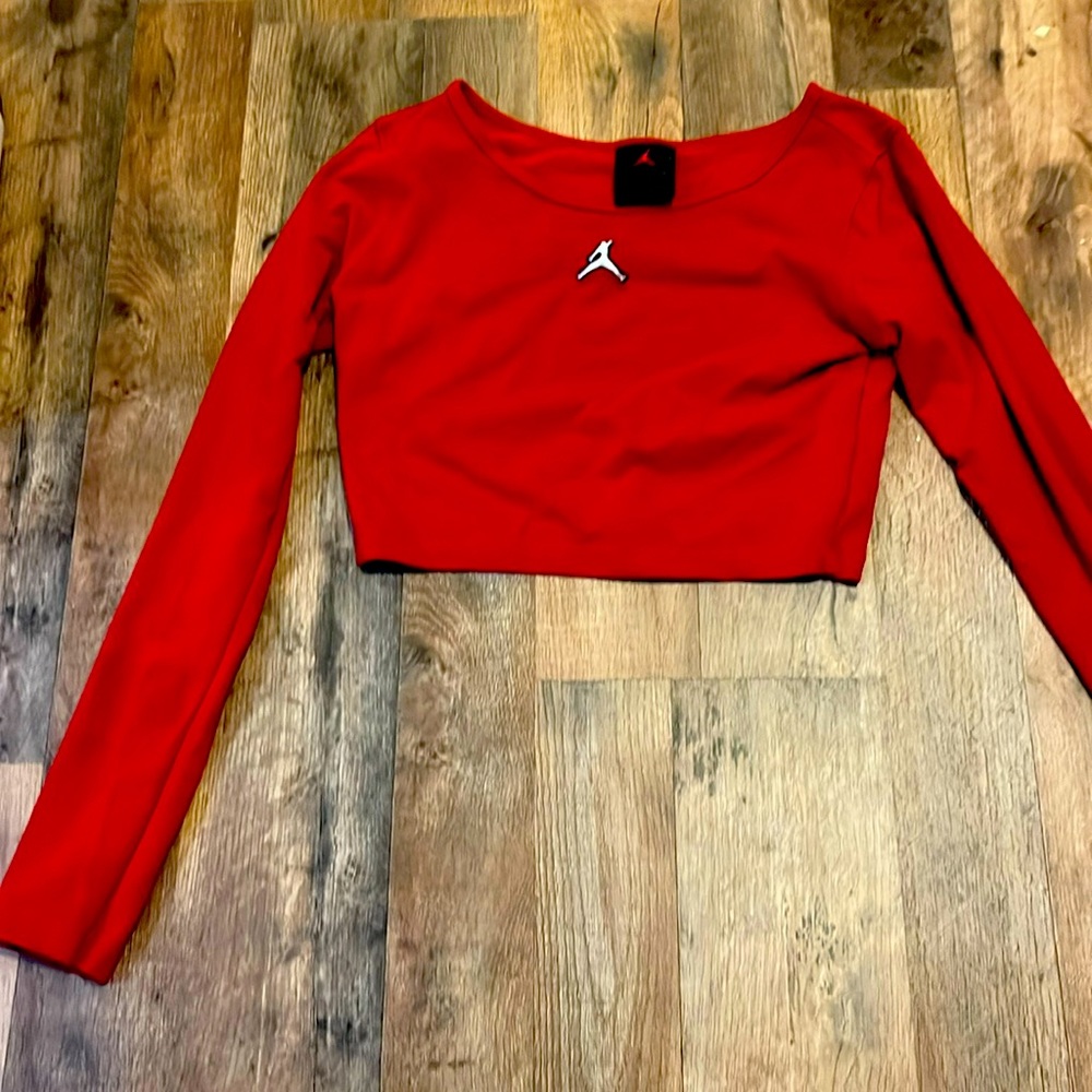 Jordan red slightly cropped long sleeve. Wore once but not really my style